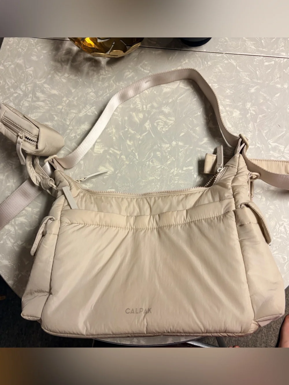 Calpak Crossbody diaper bag AND pacifier pouch in oatmeal